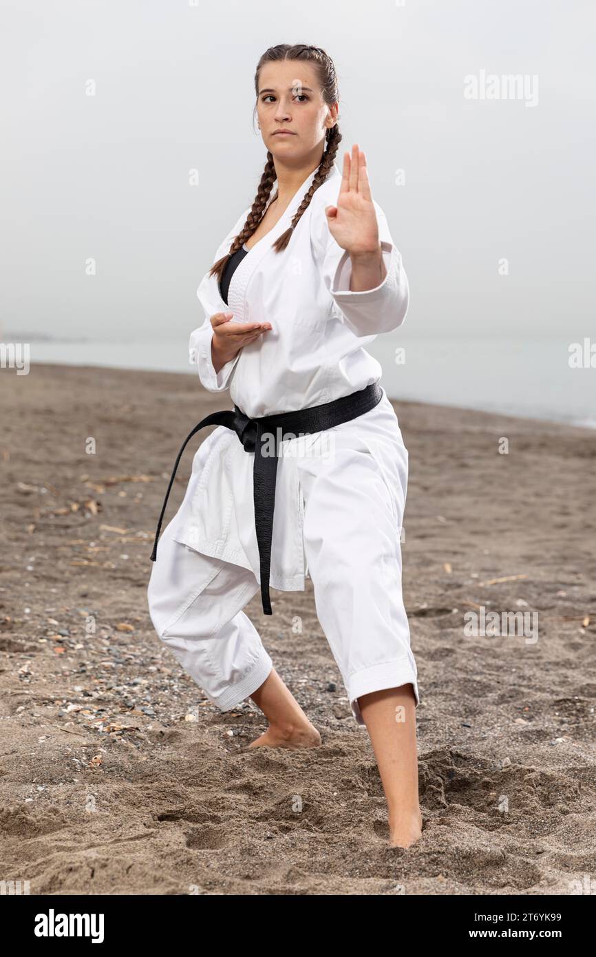 Female model karate costume training Stock Photo