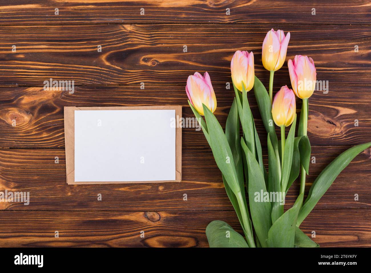 Frame letter with bouquet tulips Stock Photo