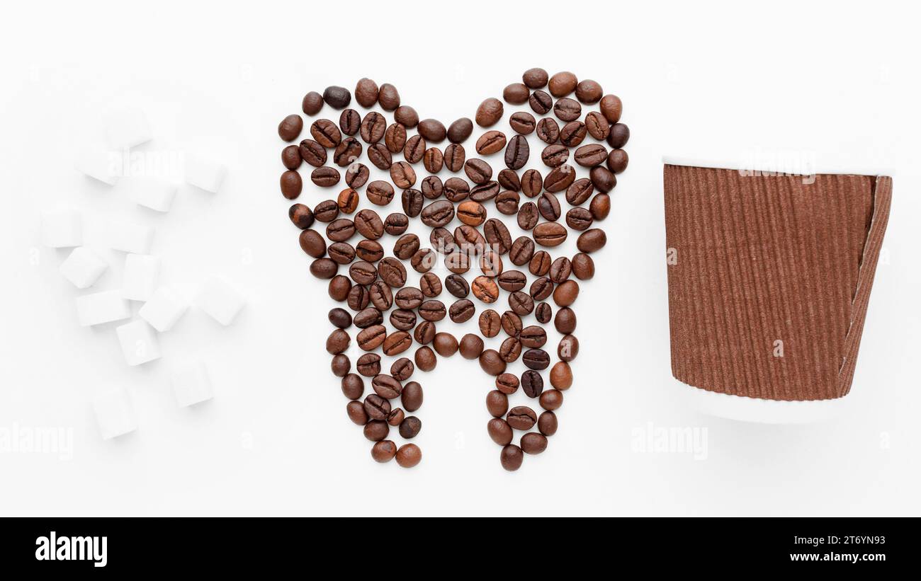 Tooth shape made coffee beans Stock Photo Alamy