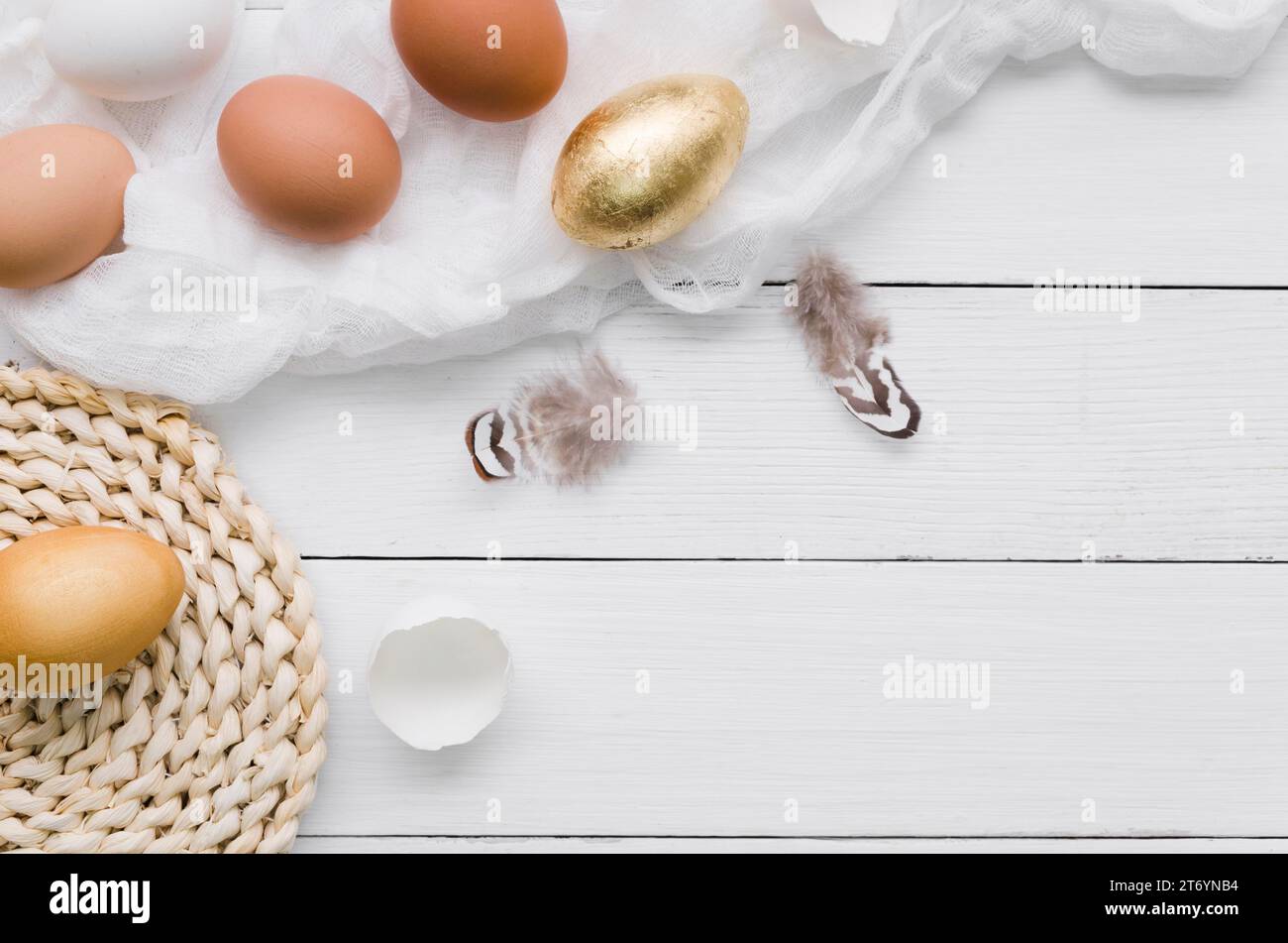 Top view eggs easter with gold paint feathers Stock Photo