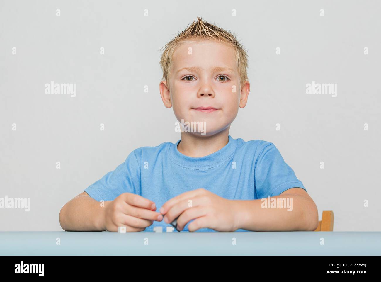 Portrait cute kid with blonde hair Stock Photo