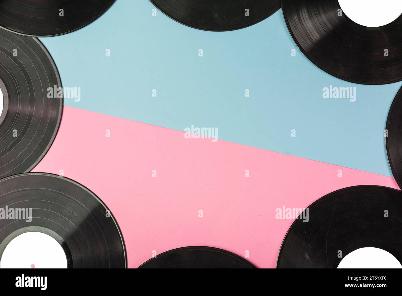 Vinyl records border dual blue pink background Stock Photo