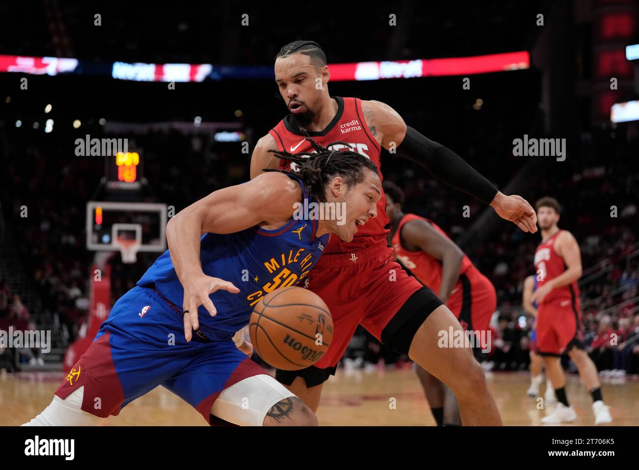 Denver Nuggets' Aaron Gordon (50) drives toward the basket as Houston ...