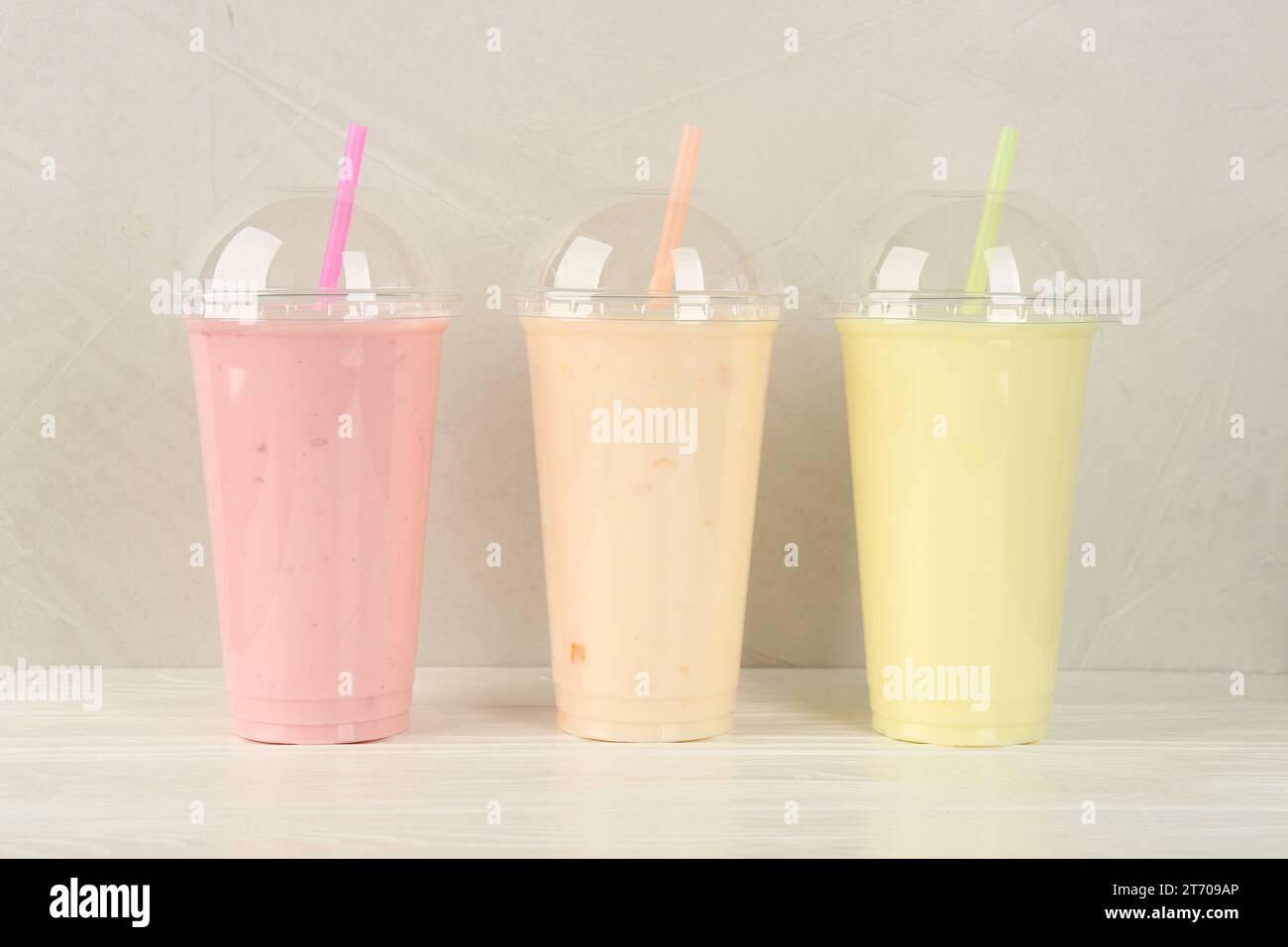 Pomegranite Smoothie sitting on white ready to drink in a to go cup Stock  Photo - Alamy