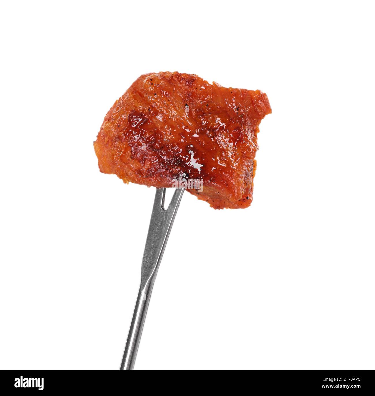 Fondue fork with piece of fried meat isolated on white Stock Photo Alamy