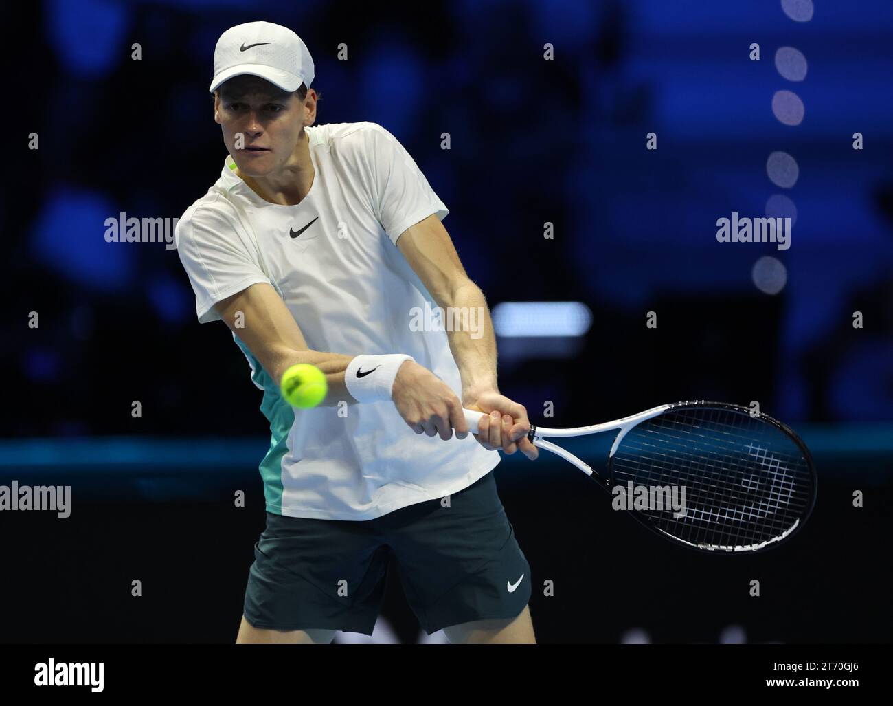 (231113) -- TURIN, Nov. 13, 2023 (Xinhua) -- Jannick Sinner hits a return during the group stage match between Jannick Sinner of Italy and Stefanos Tsitsipas of Greece at ATP Finals tennis tournament in Turin, Italy, on Nov. 12, 2023. (Photo by Federico Tardito/Xinhua) Stock Photo