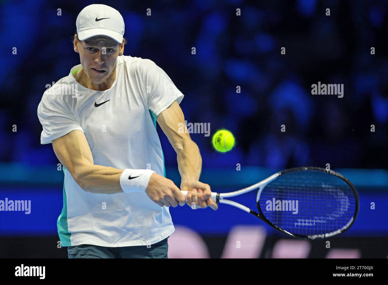 (231113) -- TURIN, Nov. 13, 2023 (Xinhua) -- Jannick Sinner hits a return during the group stage match between Jannick Sinner of Italy and Stefanos Tsitsipas of Greece at ATP Finals tennis tournament in Turin, Italy, on Nov. 12, 2023. (Photo by Federico Tardito/Xinhua) Stock Photo