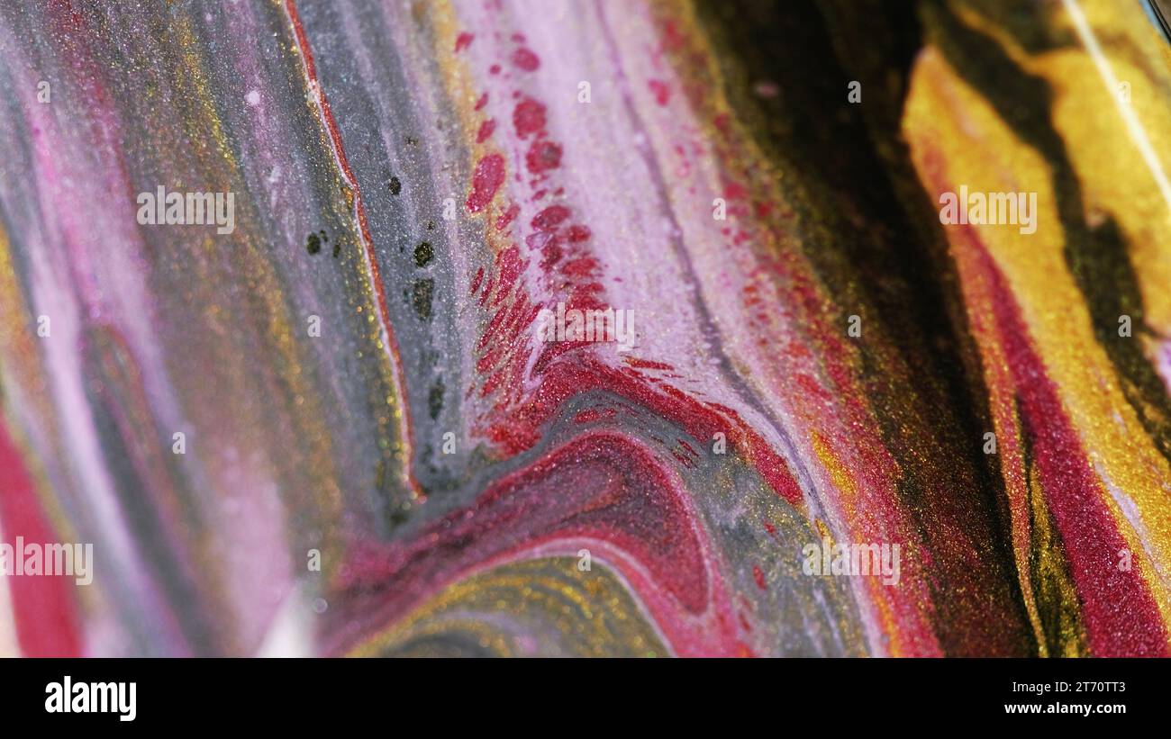 Glitter fluid texture paint flow color ink mix Stock Photo - Alamy