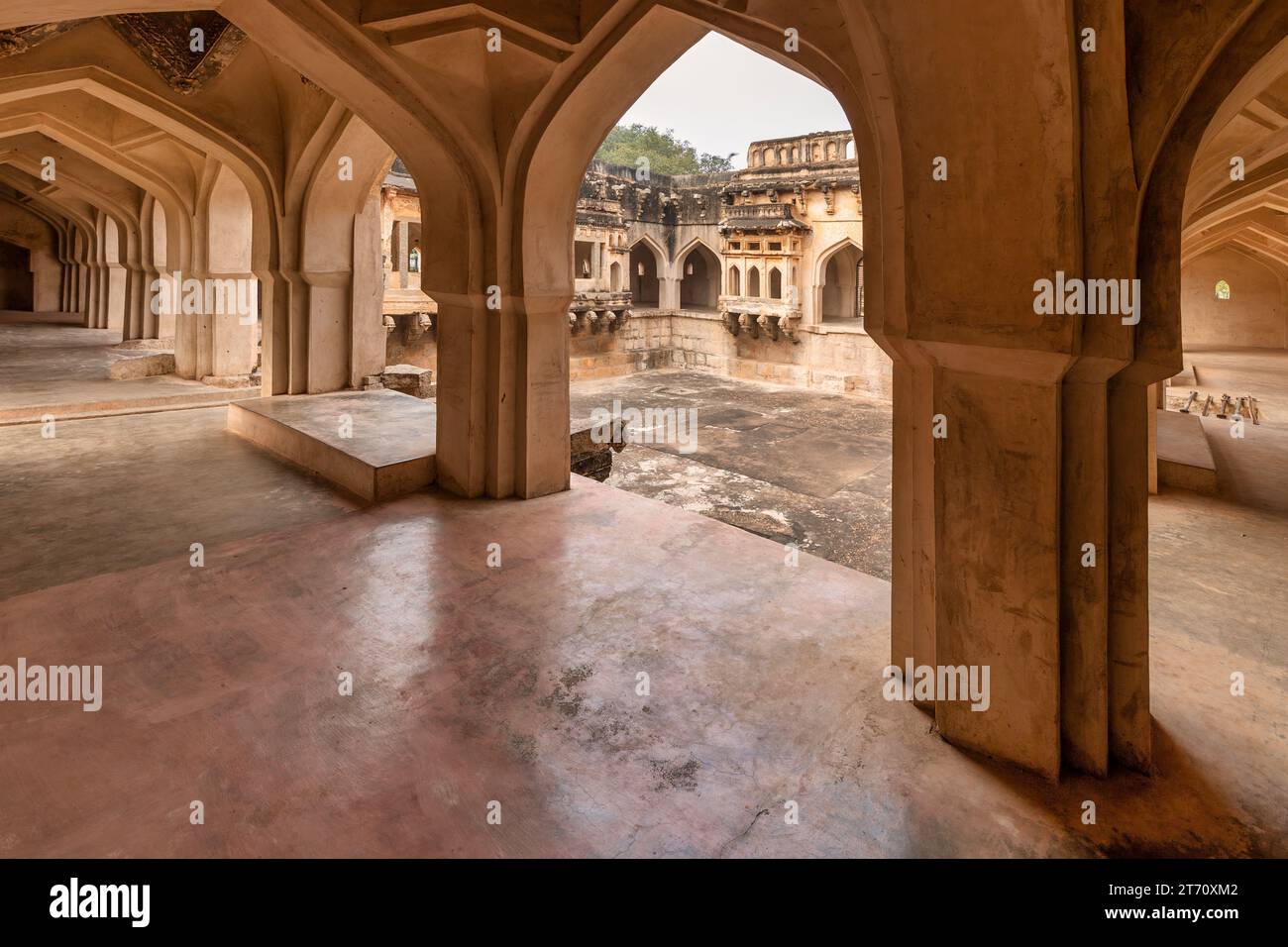 Ancient architecture ruins of Queen's bath in the medieval royal enclave at Hampi, Karnataka India Stock Photo