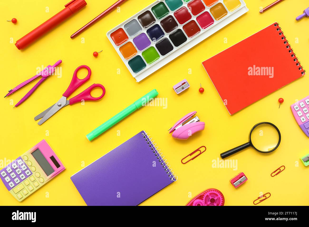 Composition with different school supplies on yellow background Stock Photo