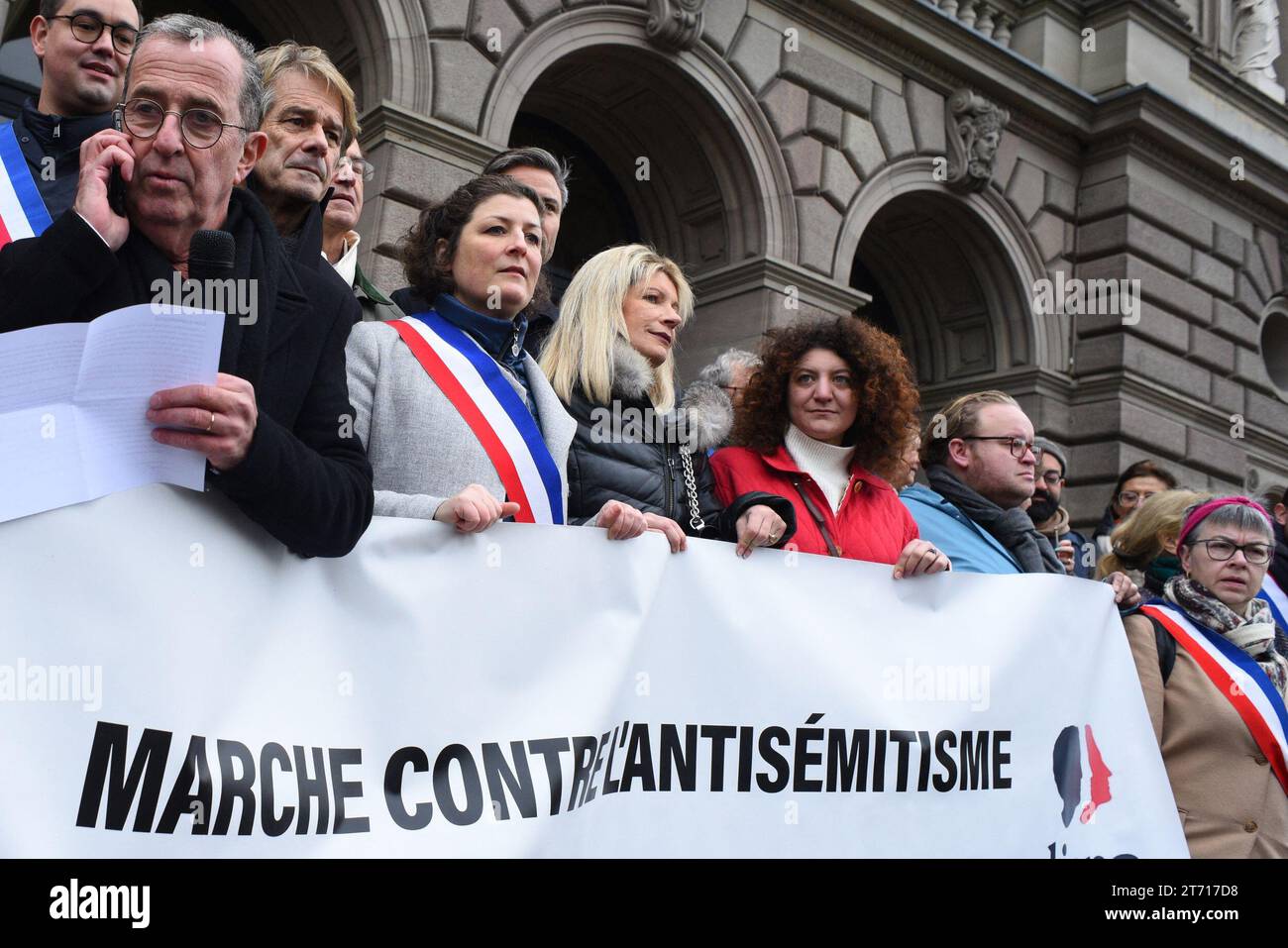 Vice-President of the Jewish Consistory of the Bas-Rhin Thierry Ross and Mayor of Strasbourg Jeanne Barseghian take part in a demonstration against anti-Semitism in Strasbourg, eastern France, on November 12, 2023. Tens of thousands marched against anti-Semitism in cities across France amid bickering by political parties over who should take part and a surge in anti-Semitic incidents across France. Tensions have been rising across France, home to large Jewish and Muslim communities, in the wake of the October 7 attack by Palestinian militant group Hamas on Israel, followed by a month of Israel Stock Photo