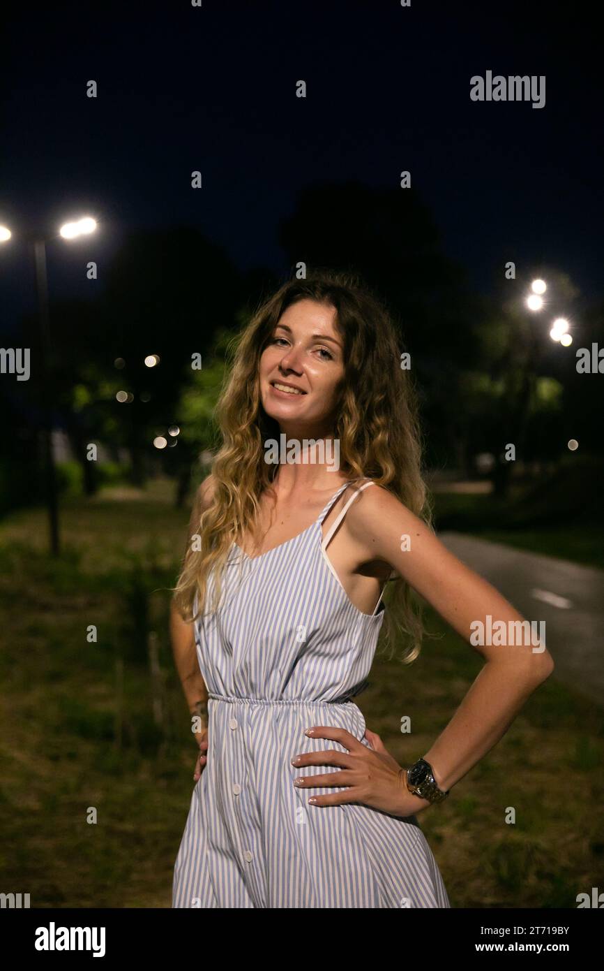 woman at night summer vacation walk trip Stock Photo
