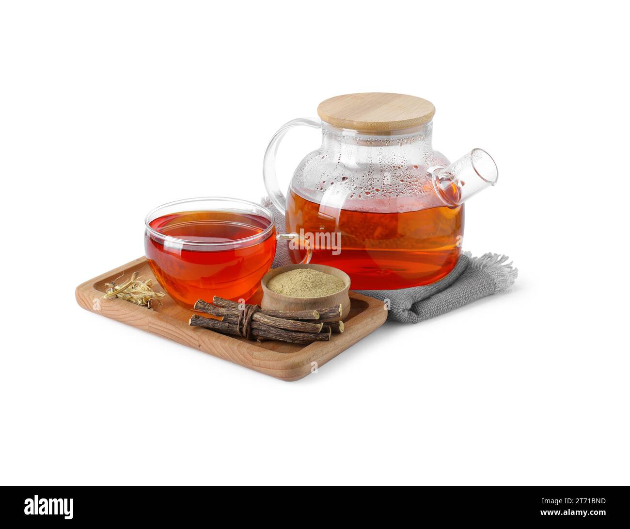 Aromatic licorice tea, dried sticks of licorice root and powder on