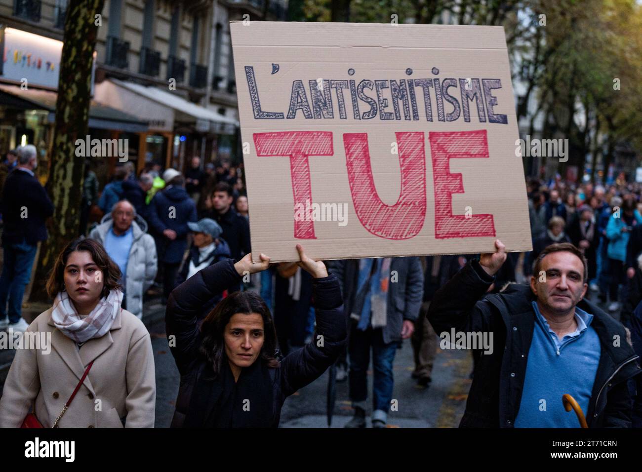 Tens of thousands march on Sunday November 12, 2023 in Paris against anti-Semitism amid bickering by political parties over who should take part and a surge in anti-Semitic incidents across France. Tensions have been rising in the French capital, home to large Jewish and Muslim communities, in the wake of the October 7 attack by Palestinian militant group Hamas on Israel, followed by a month of Israeli bombardment of the Gaza Strip. France has recorded nearly 1250 anti-Semitic acts since the attack. National Assembly speaker Yael Braun-Pivet and Gerard Larcher, the Senate speaker, called on No Stock Photo