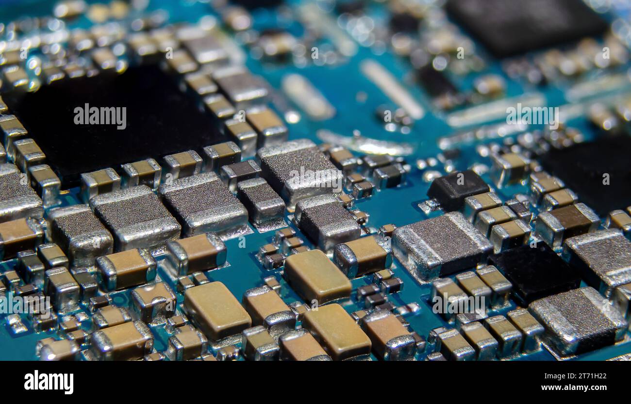 Macro shot of the smartphone's main board with surface mounted passive and active components Stock Photo