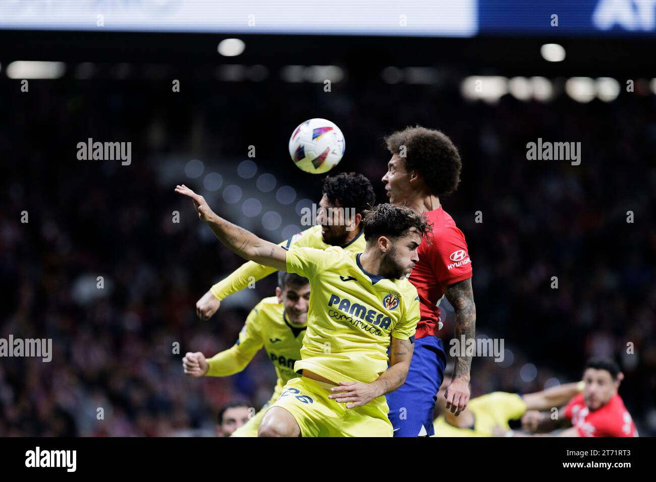 Madrid, Spain. 12th Nov, 2023. Axel Witsel of Atletico de Madrid and Adria Alti of Villarreal in action during the La Liga 2023/24 match between Atletico de Madrid and Villarreal at Civitas Metropolitano Stadium. Final score; Atletico de Madrid 3:1 Villarreal Credit: SOPA Images Limited/Alamy Live News Stock Photo