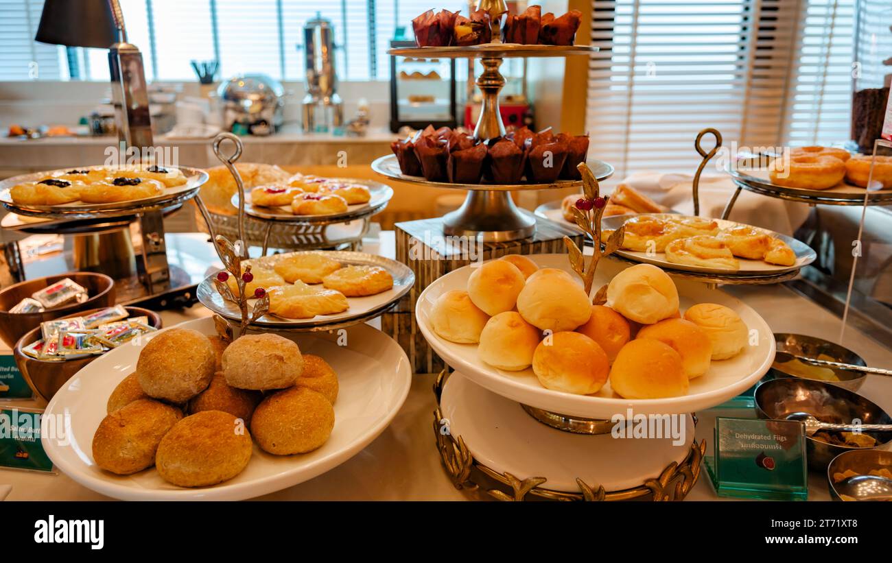 breakfast buffet in a luxury hotel in Thailand, sweets and bread on a ...