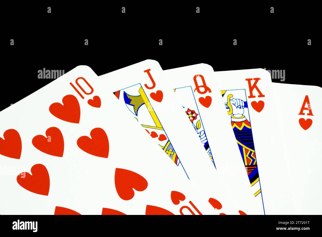 closeup royal flush of hearts on black background Stock Photo