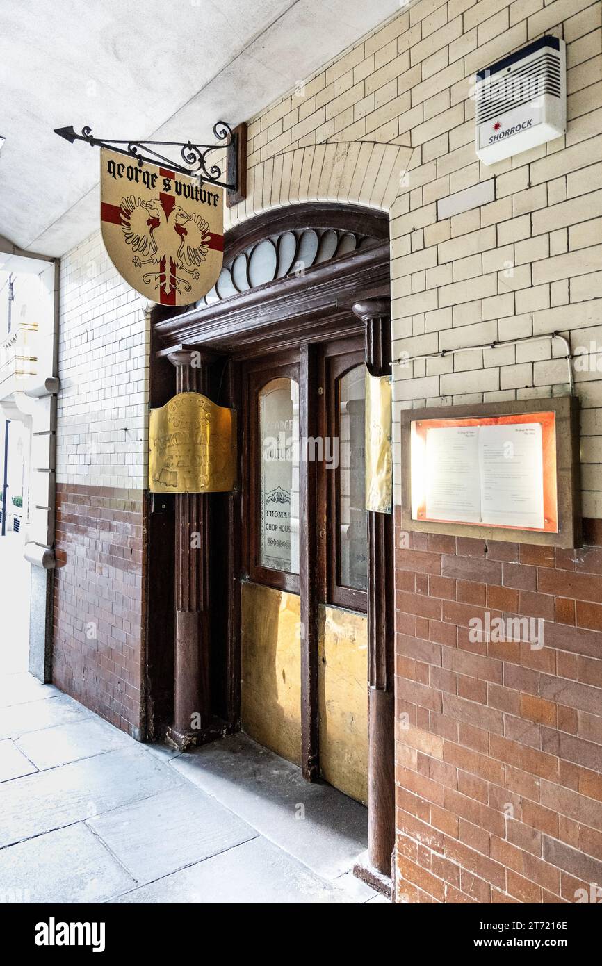 Entrance to George & Vulture Chop House in St Michael's Alley, Square Mile, London, England Stock Photo