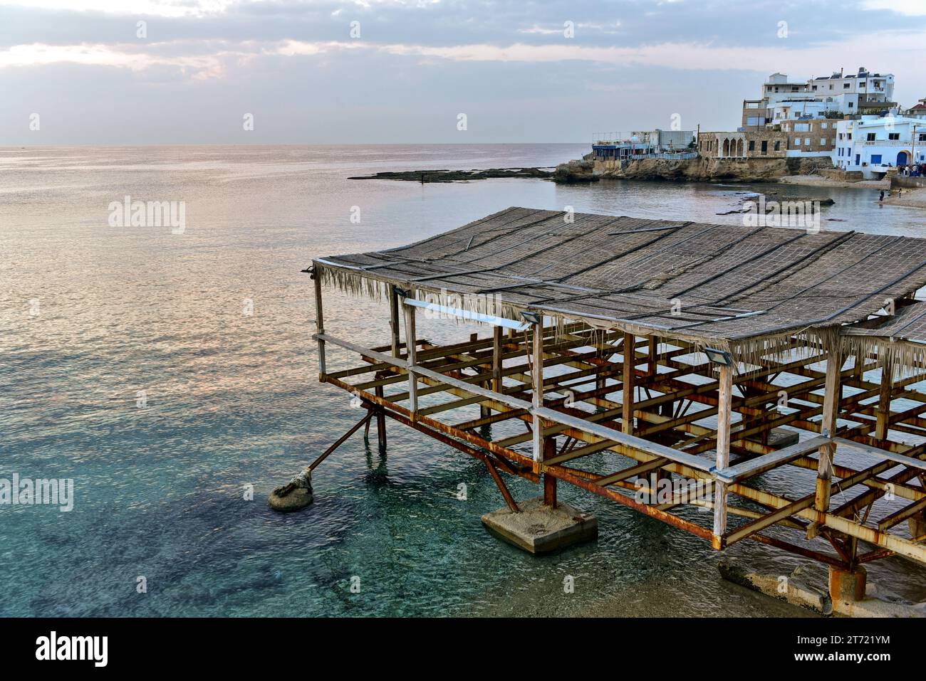 View of Batroun Bay over early dinner on the roof terrace of Le Marin Restaurant in Batroun, Lebanon Stock Photo