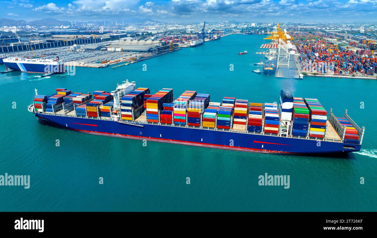 Aerial view of cargo ship carrying container running for export import