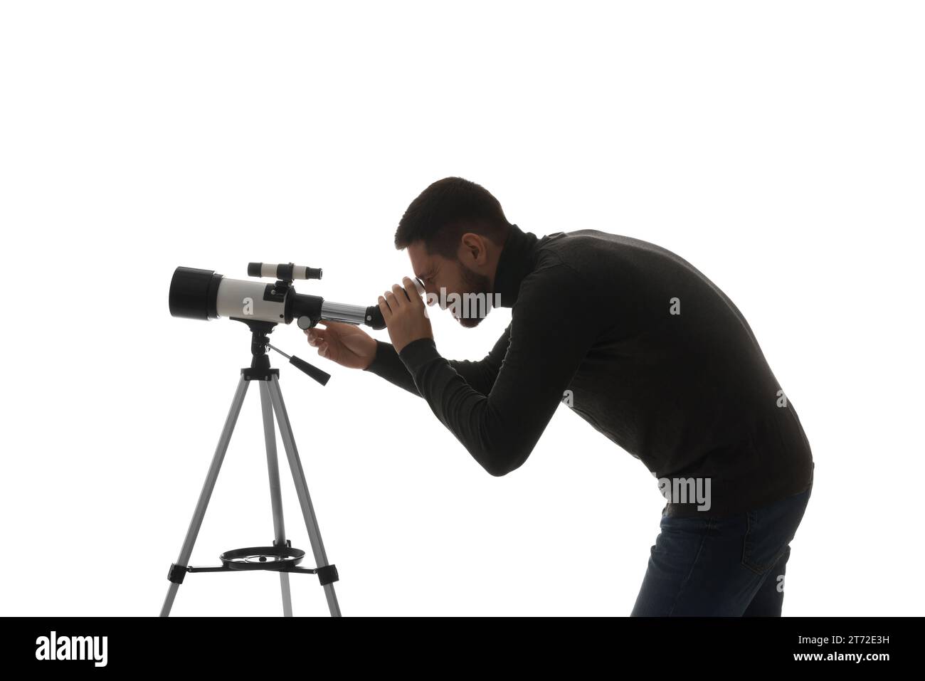 Astronomer looking at stars through telescope on white background Stock