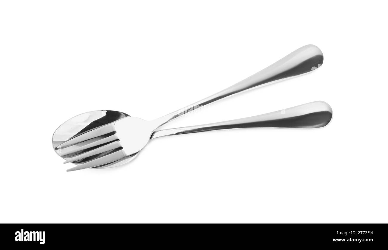 Clean shiny fork and spoon isolated on white. Cooking utensils Stock