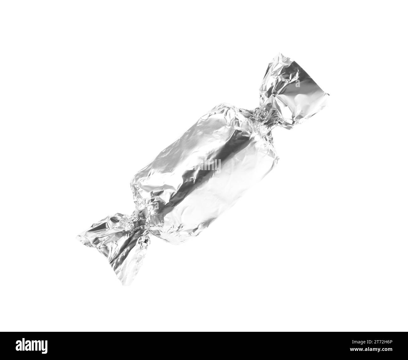 Tasty candy in silver wrapper isolated on white Stock Photo