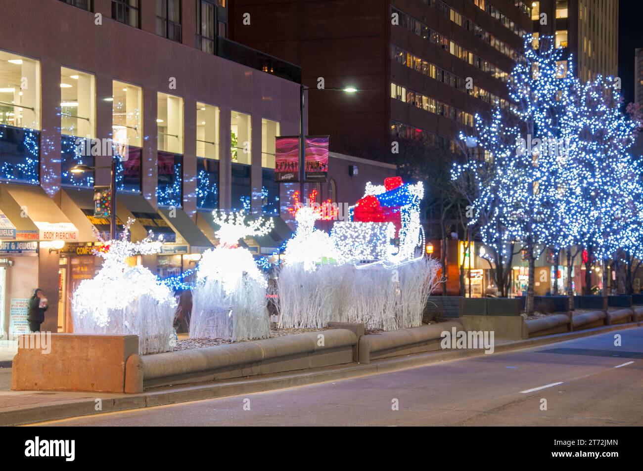 Toronto, Canada, Christmas lights in the intersection of College Street and Yonge Avenue in the downtown district. Stock Photo