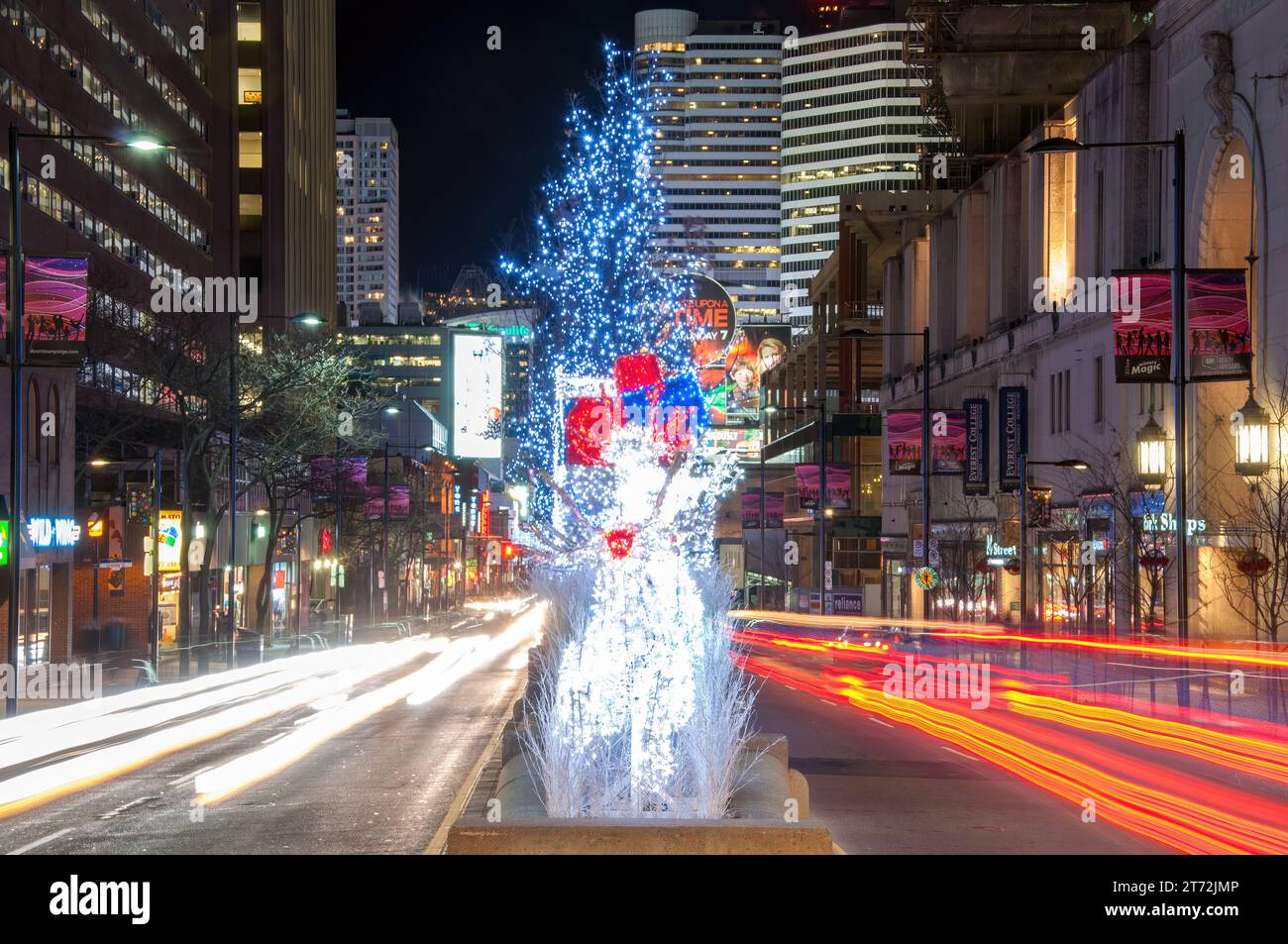 Toronto, Canada, Christmas lights in the intersection of College Street and Yonge Avenue in the downtown district. Stock Photo