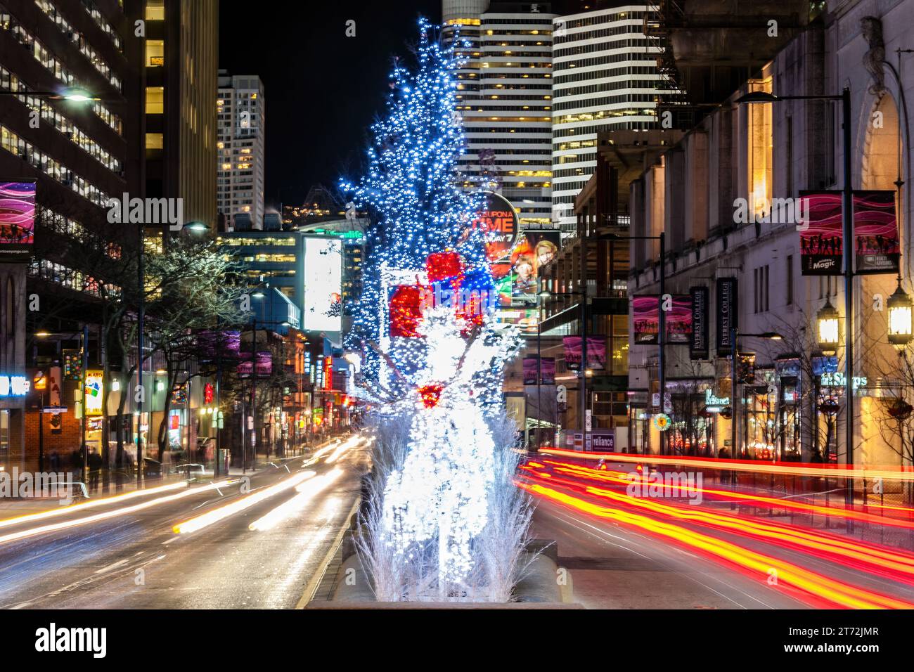 Toronto, Canada, Christmas lights in the intersection of College Street and Yonge Avenue in the downtown district. Stock Photo