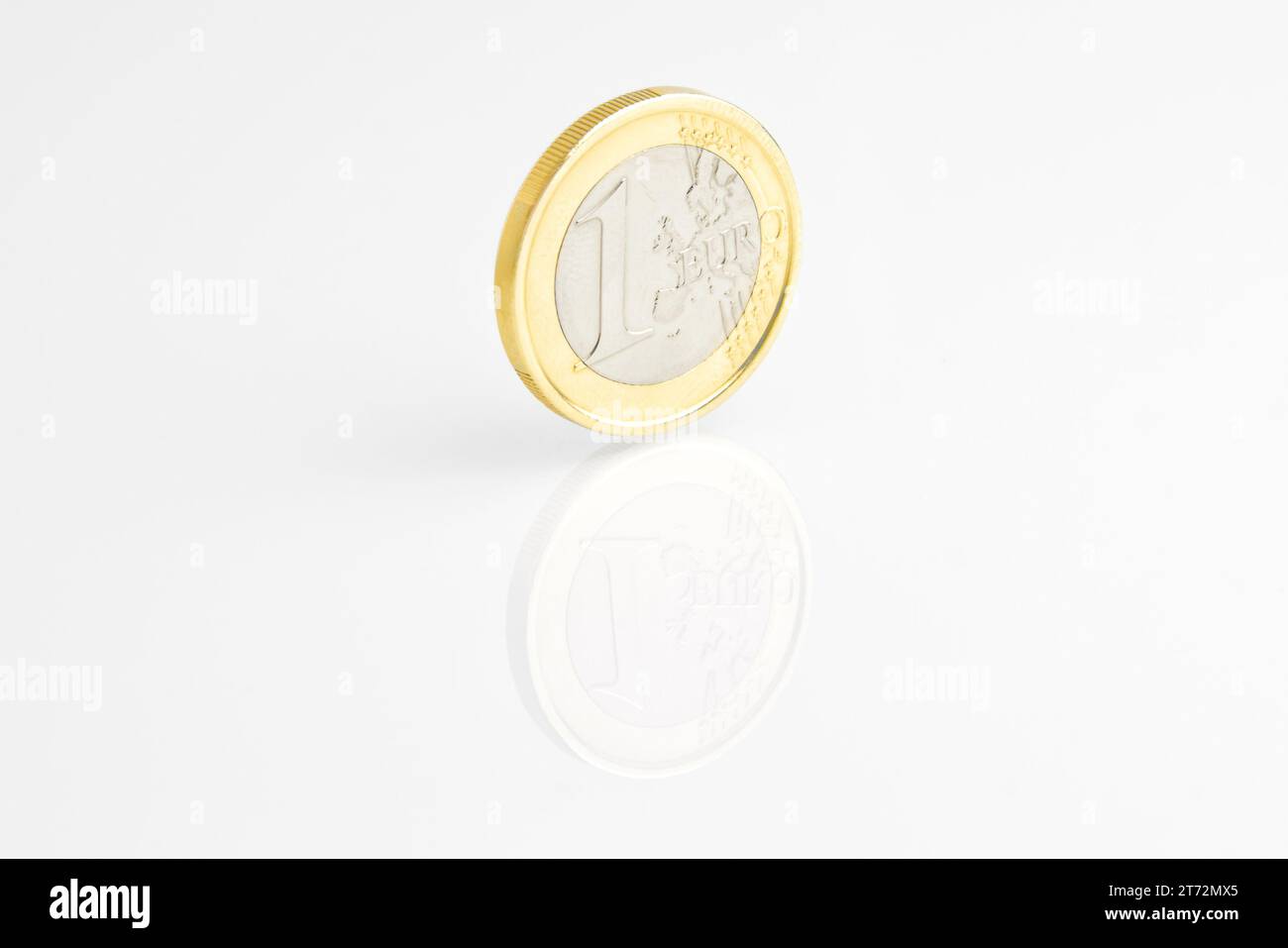 one euro coin reflected on white background Stock Photo - Alamy