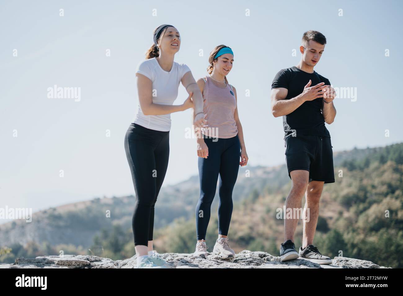 Group of Friends Enjoying a Sunny Day Hiking in the Wilderness Stock ...