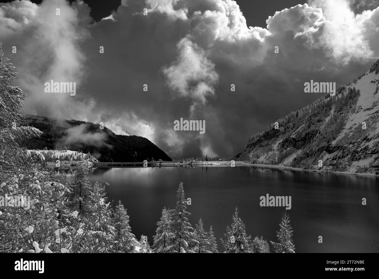 Snowy mountains and their lake in black and white Stock Photo - Alamy
