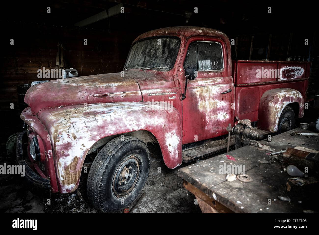 Old International Pickup in a garage in North Dakota Stock Photo