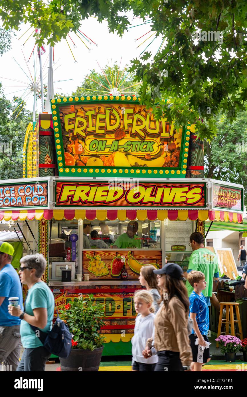 Falcon Heights, Minnesota - August 26, 2023: Fried Fruit on a Stick booth featuring Fried Olives at the Minnesota State Fair on the fairgrounds Stock Photo