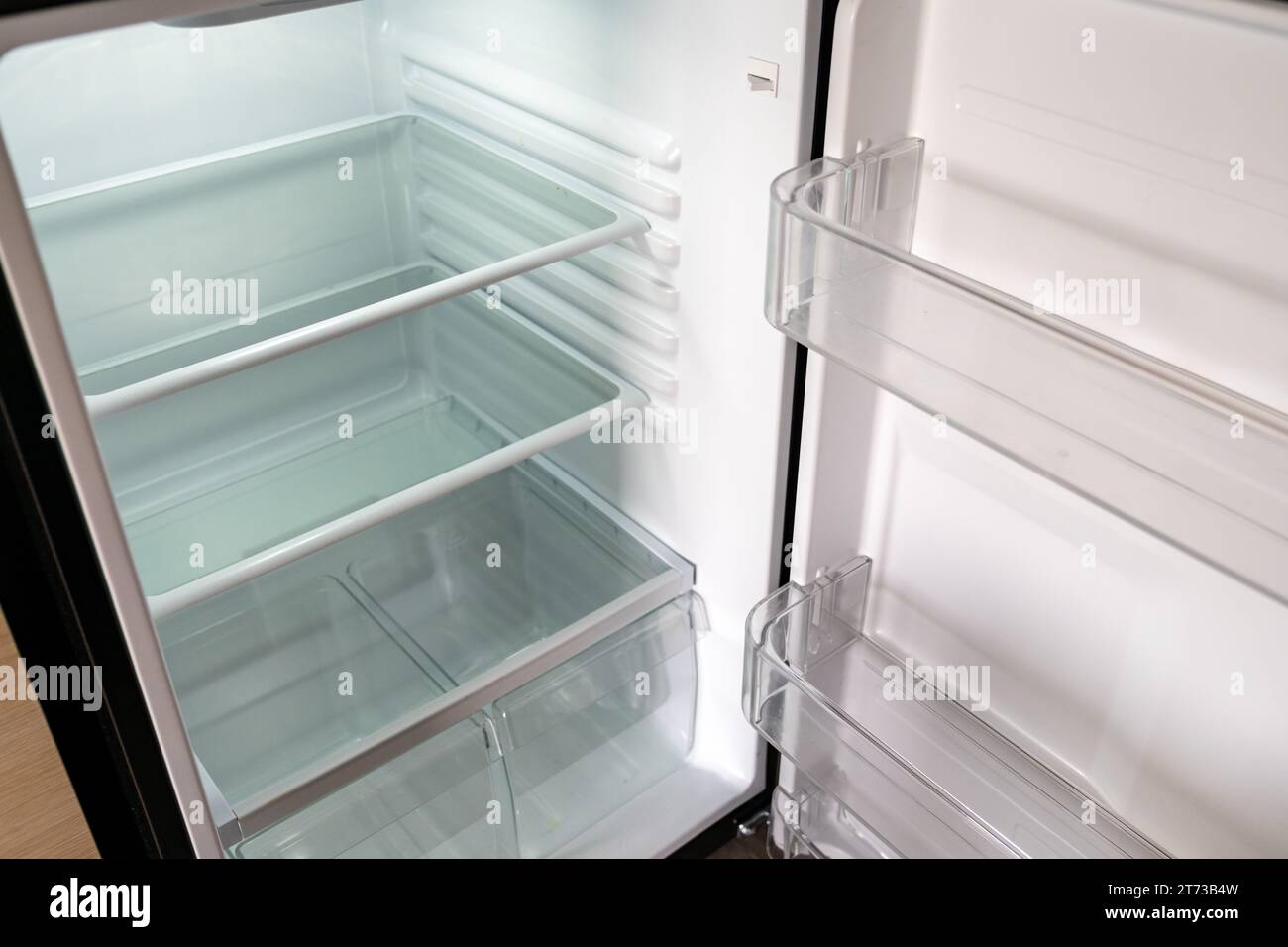 Empty white refrigerator, very clean with door open Stock Photo