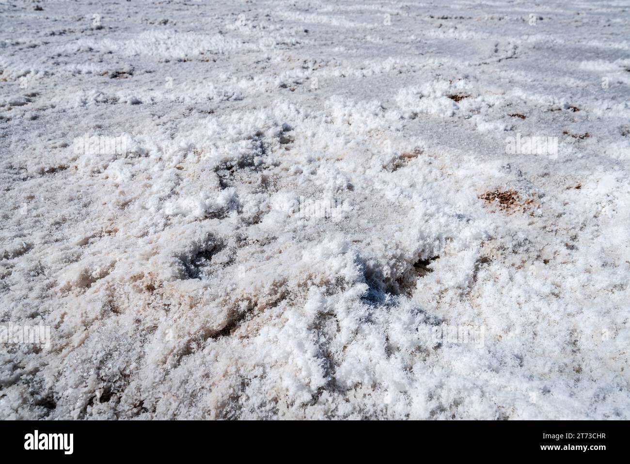Close-up image of salt crystals on the ground of Badwater Basin in Death Valley National Park in California Stock Photo
