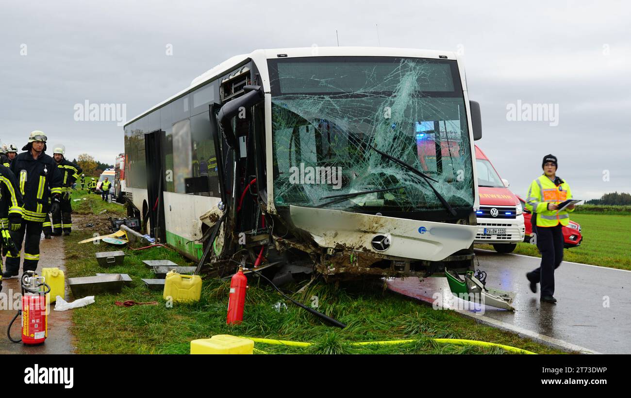 Bad Waldsee, Germany. 13th Nov, 2023. A badly damaged school bus stands on a road after an accident with several casualties (dpa: 'At least 17 injured in school bus accident') Credit: David Pichler/dpa - ATTENTION: Parts of the picture have been pixelated for legal reasons/dpa/Alamy Live News Stock Photo