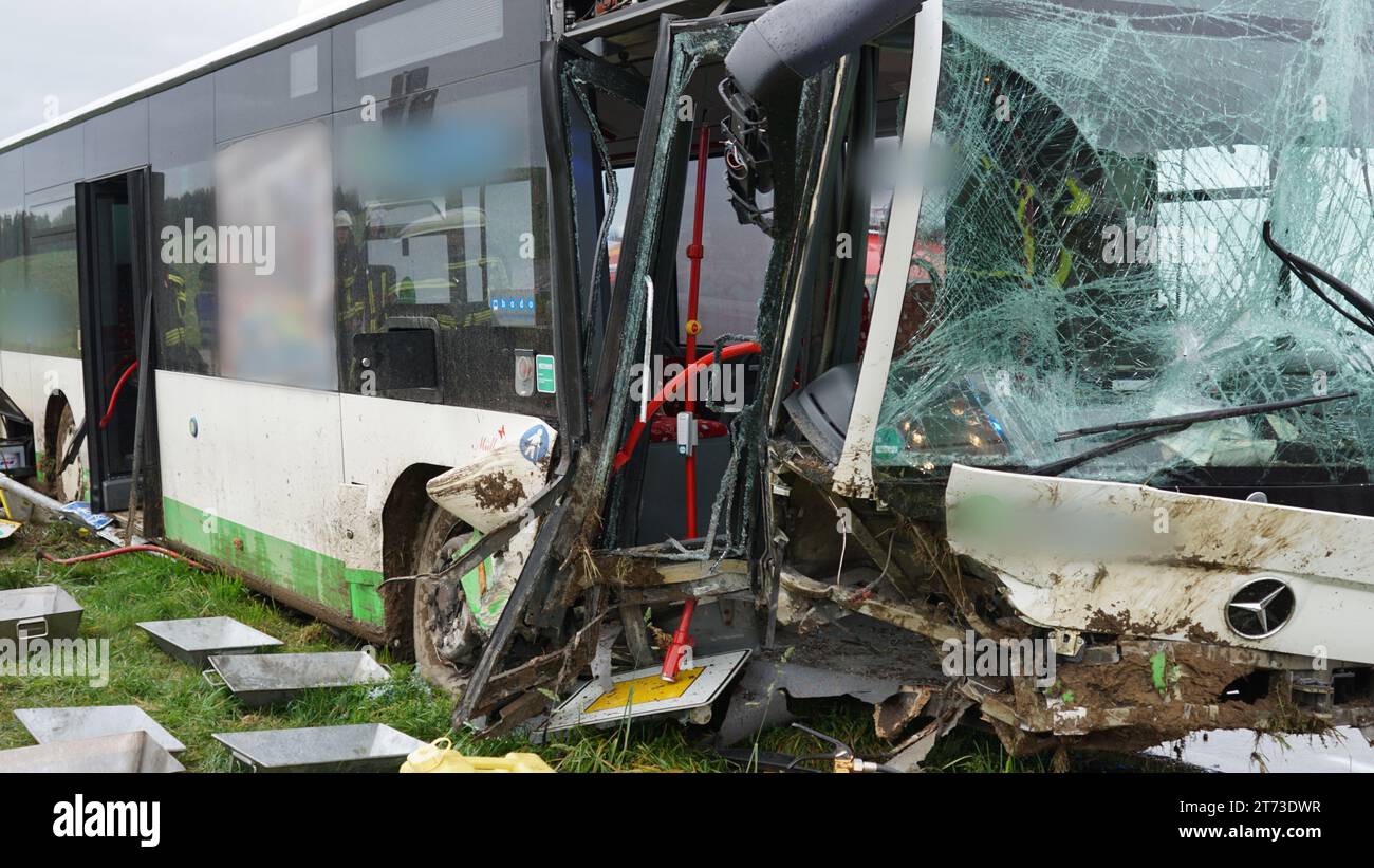 Bad Waldsee, Germany. 13th Nov, 2023. A badly damaged school bus stands on a road after an accident with several casualties (to dpa: 'At least 17 injured in school bus accident') Credit: David Pichler/dpa - ATTENTION: Parts of the picture have been pixelated for legal reasons/dpa/Alamy Live News Stock Photo