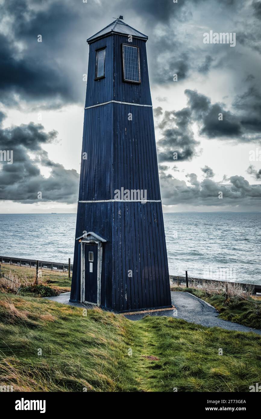 The Samphire Tower taken at Samphire Hoe nature reserve country park, Dover, with a dark moody sky Stock Photo