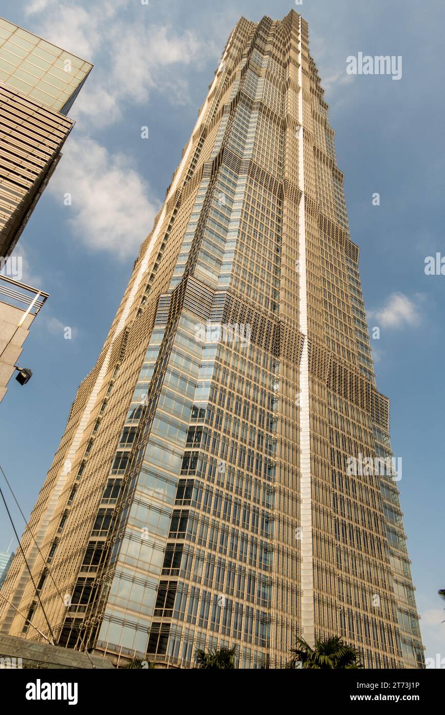 Jin Mao Tower also known as the Jinmao Building or Jinmao Tower, is a 420.5-meter-tall (1,380 ft), 88-story (93 if counting the floors in the spire) l Stock Photo