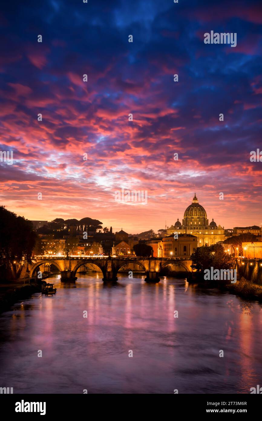 Saint Peter's Basilica with Sant' Angelo's Bridge Over Tiber At Sunset, Rome, Lazio, Italy Stock Photo