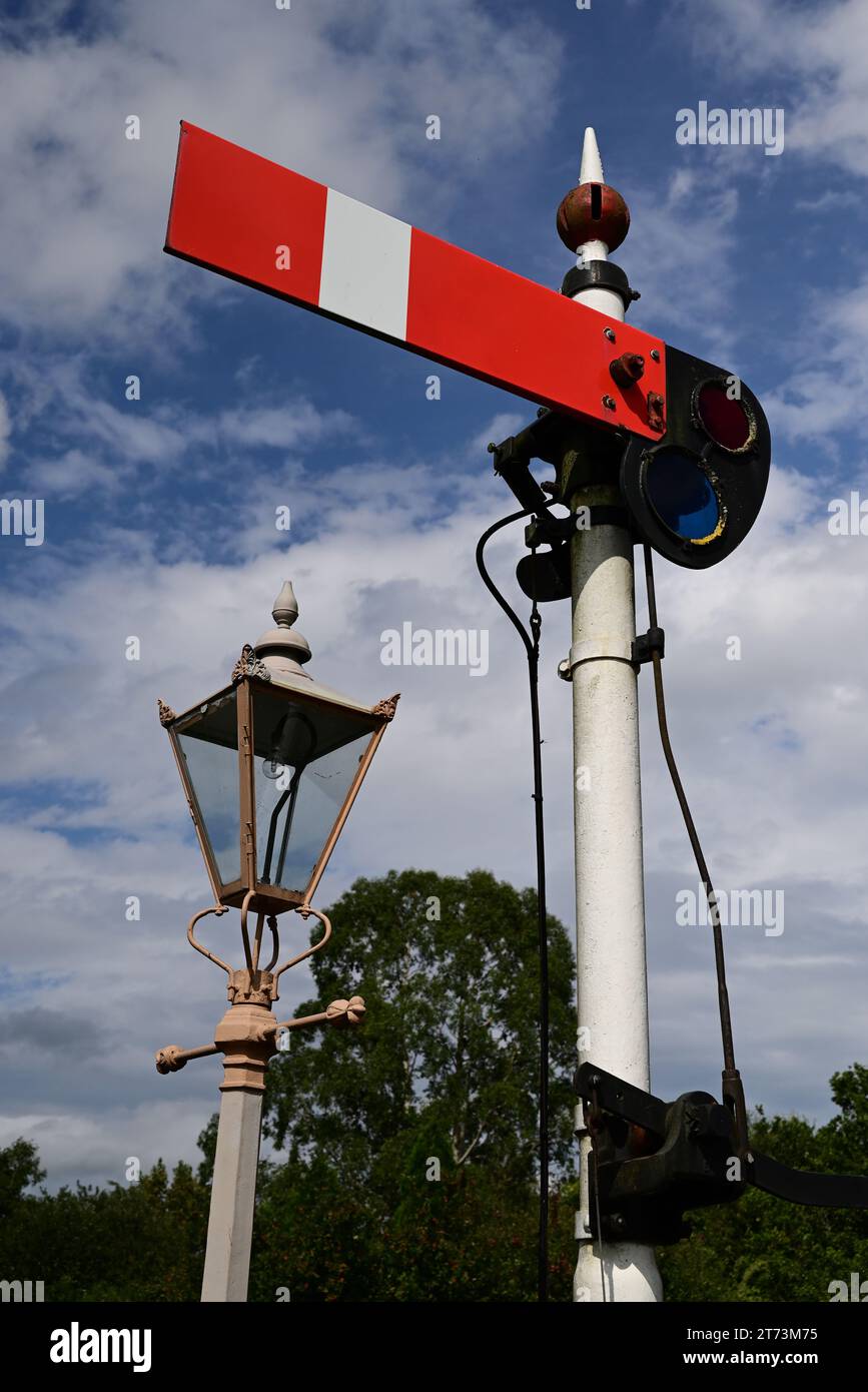 Lamp post and semaphore signal at Totnes Riverside station on the South Devon Railway. Stock Photo