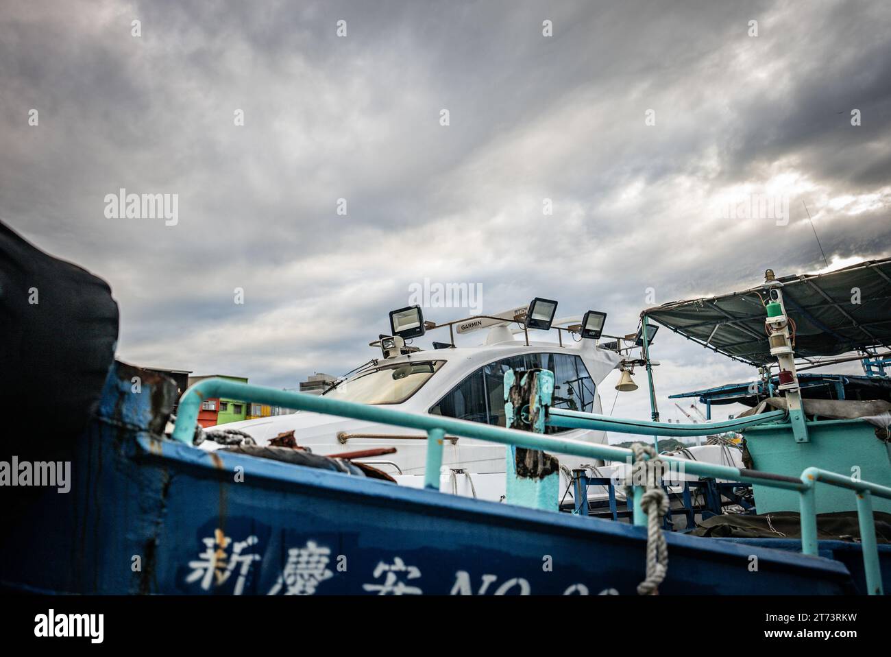 Boat in Colorful Zhengbin Fishing Port at Zhongzheng District, Keelung, Taiwan Stock Photo