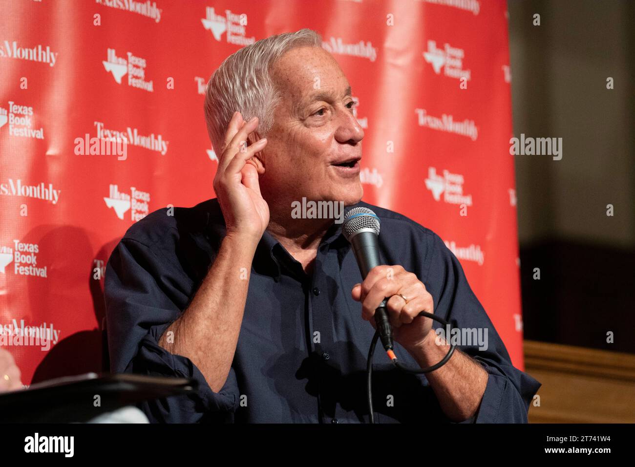 Austin Texas USA, November 11 2023: Journalist WALTER ISAACSON discusses his latest book about entrepreneur Elon Musk (not shown) during an interview at the Texas Book Festival. Isaacson, an American author, journalist, and professor, has been the President and CEO of the Aspen Institute, the chair and CEO of CNN and the editor of Time Magazine. Stock Photo