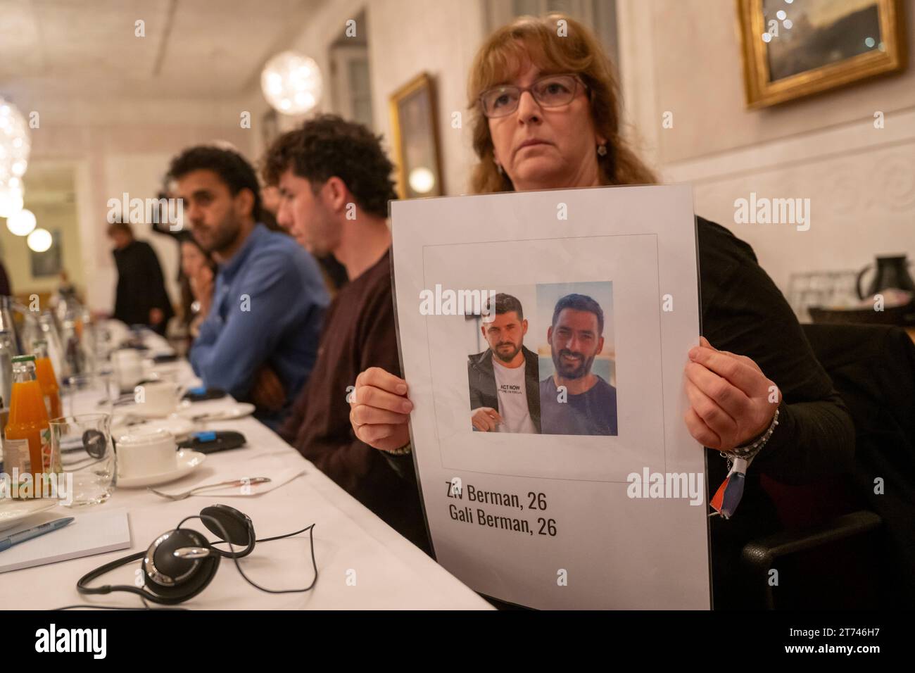 Munich, Germany. 13th Nov, 2023. Relatives of Israeli hostages held hostage by Hamas, who have printed pictures and names of their missing loved ones on posters, are received in the Bavarian state parliament by Landtag President Aigner (CSU). Credit: Peter Kneffel/dpa - ATTENTION: Only for editorial use in connection with a report on the meeting mentioned and only with full mention of the above credit/dpa/Alamy Live News Stock Photo