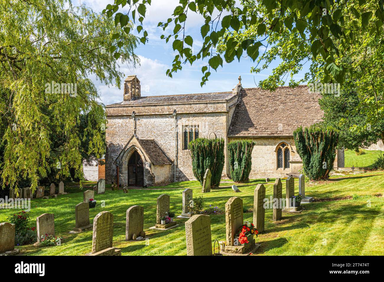 The 12th century church of St Mary Magdalene in the Cotswold village of Baunton, Gloucestershire UK Stock Photo