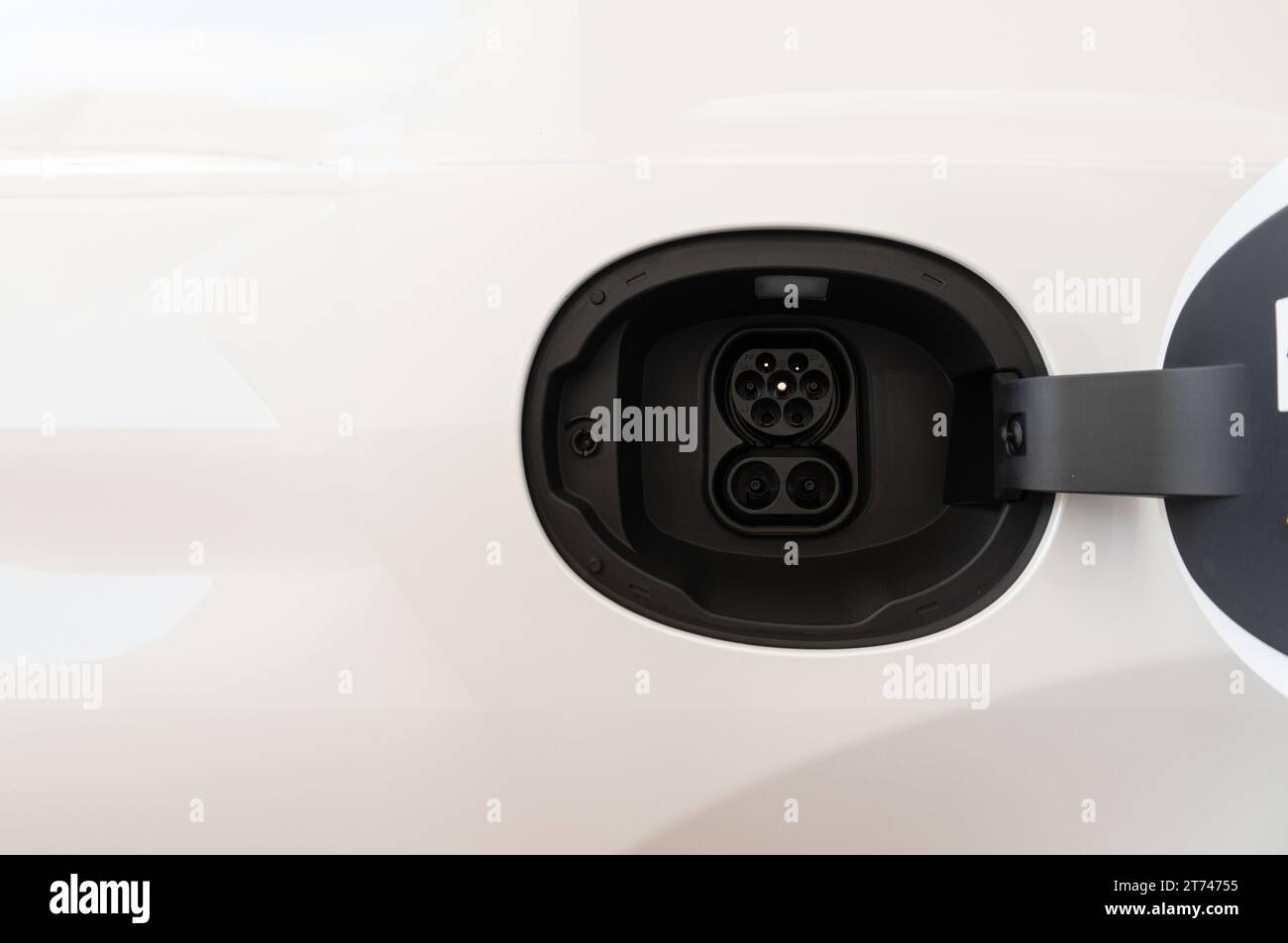 Type 2 CCS plug port on electric vehicle. DC - CCS type 2 EV charging ...