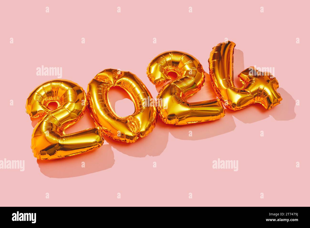 some golden numbershaped balloons forming the number 2024, as the new
